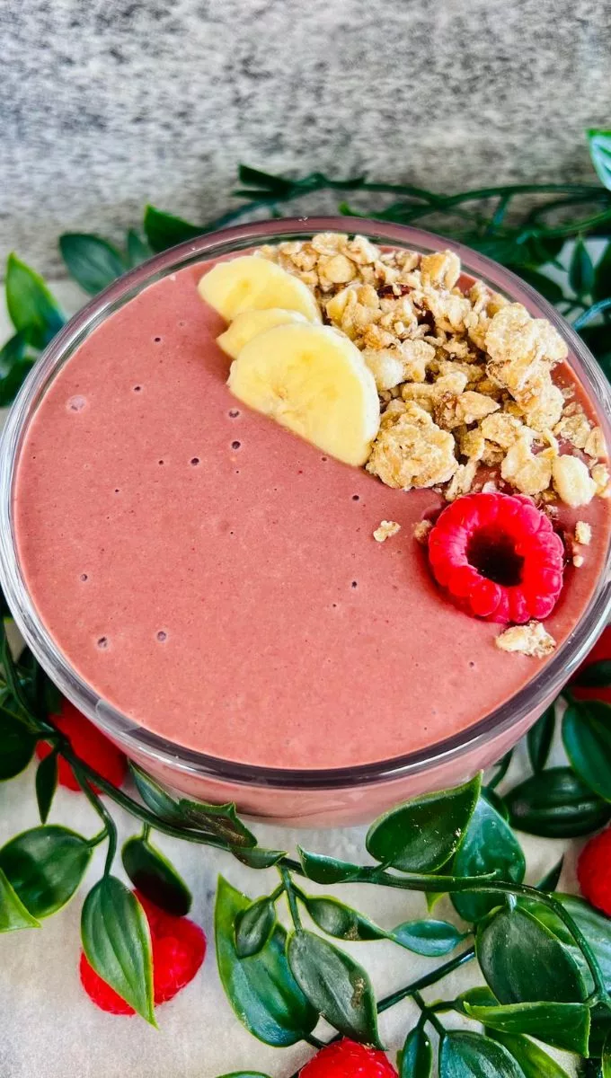 Granola Smoothie drinkable in a glass cup