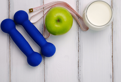 weights and apple for weight loss training