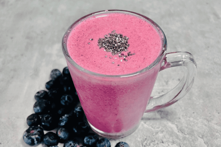blueberry smoothie topped with chia seeds