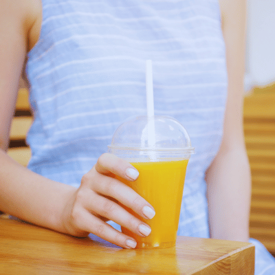 Woman holding a Jamba Juice drink