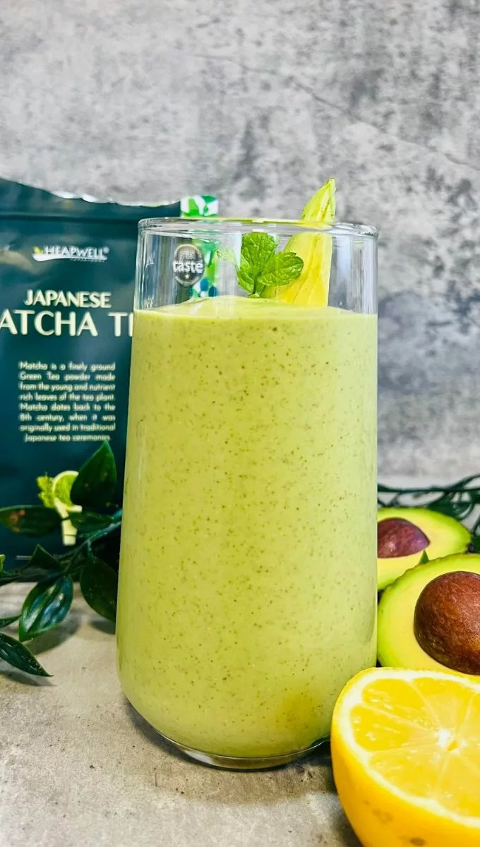 Avocado Matcha Smoothie served in a tall thin glass cup