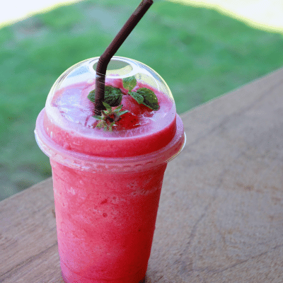 strawberry smoothie in a takeaway cup