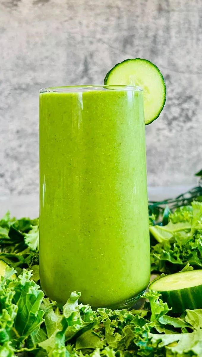 Kale Cucumber Smoothie served in a tall thin glass cup
