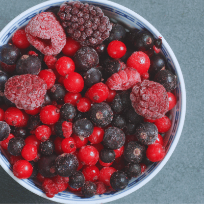 a bowl of frozen fruit