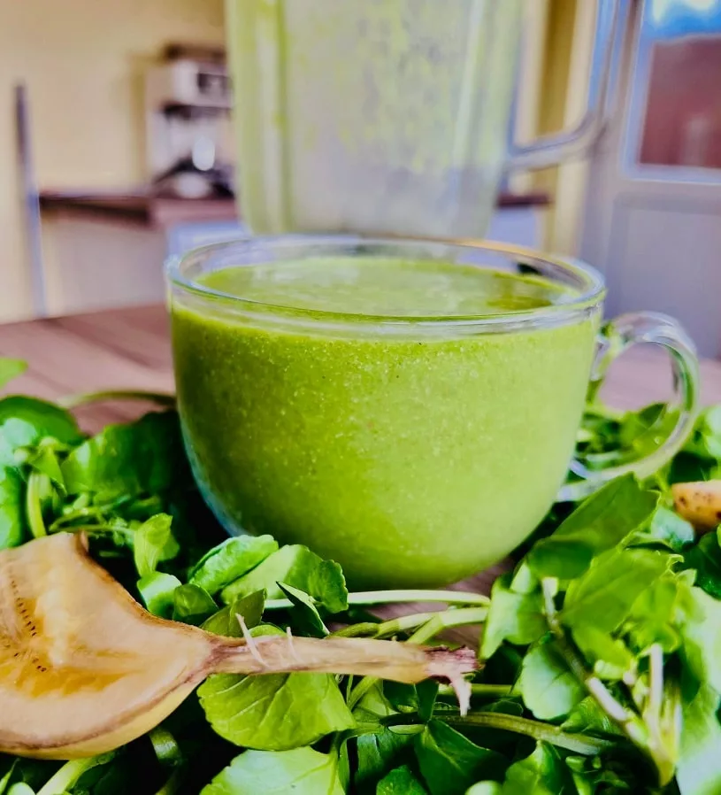 Green Watercress Smoothie surrounded by fresh watercress