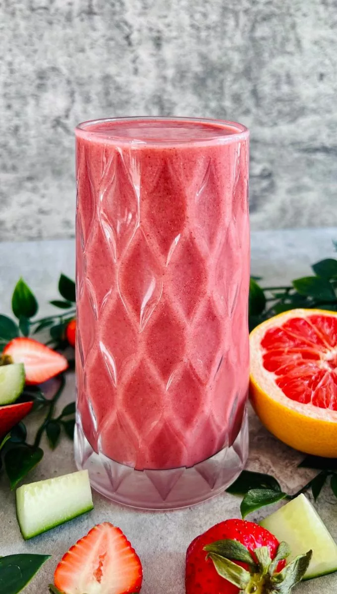 Weight Loss Grapefruit Strawberry Smoothie served in a tall thick glass cup