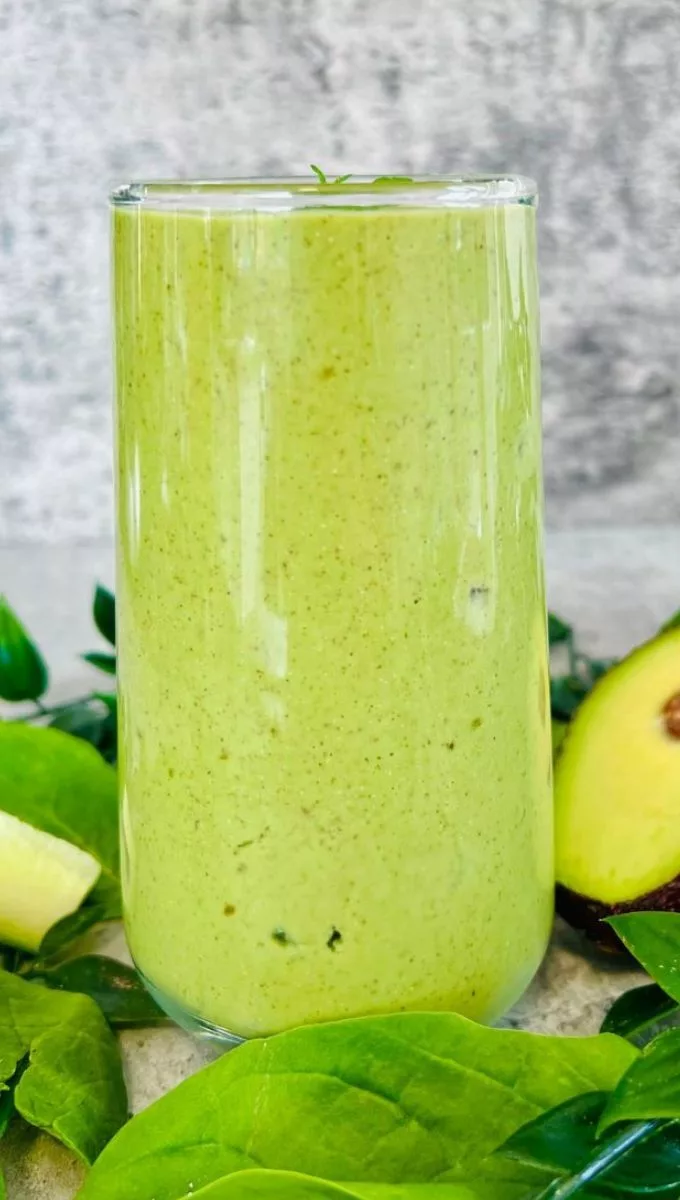Keto Wheatgrass Smoothie served in a tall thin glass cup