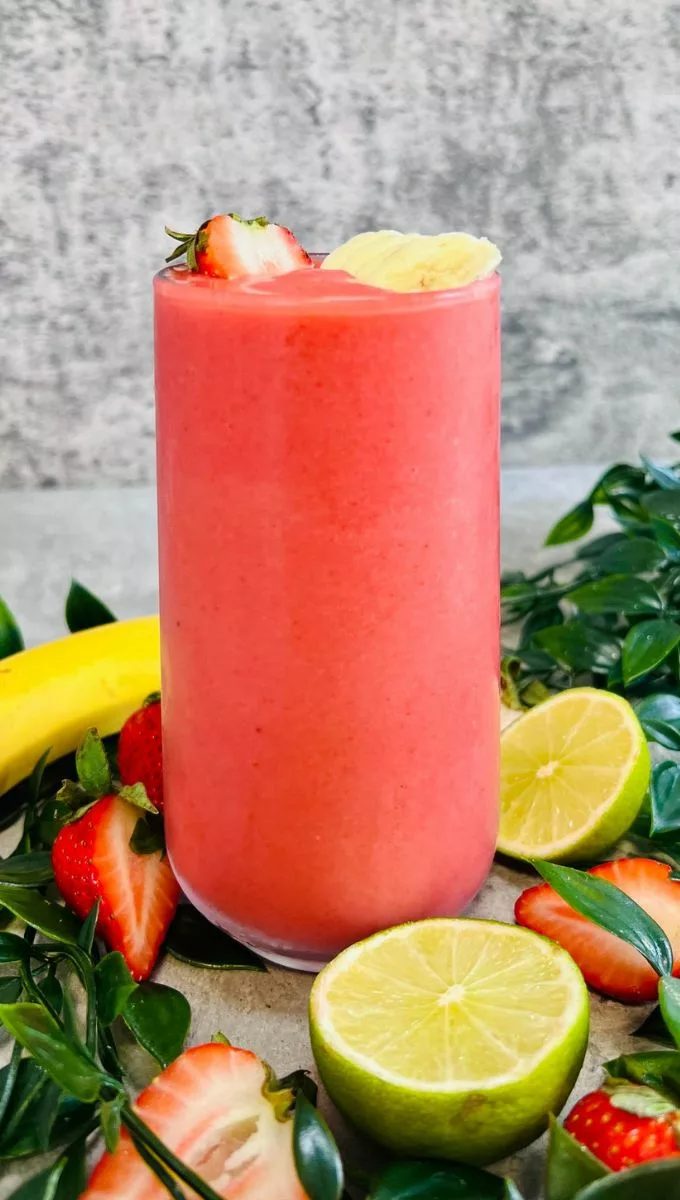 Naked Strawberry Banana Smoothie served in a tall glass cup