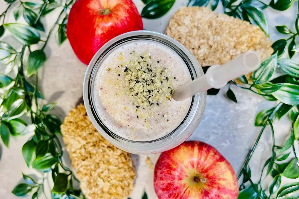Protein Weetabix Smoothie surrounded by weetabix bars and apples