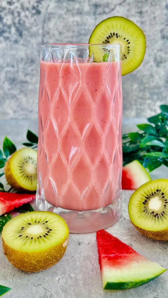 Watermelon Kiwi Smoothie served in a tall thick glass cup