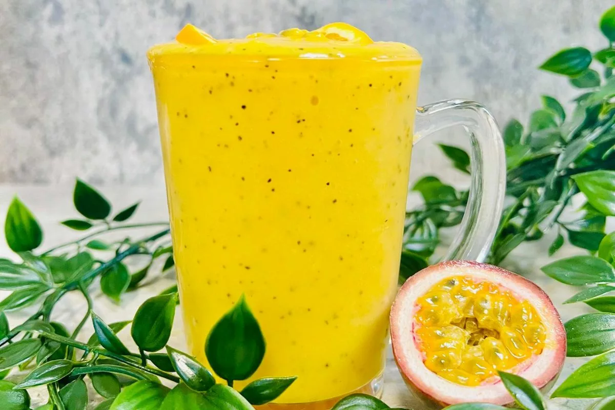 a side shot of Orange And Passion Fruit Smoothie
