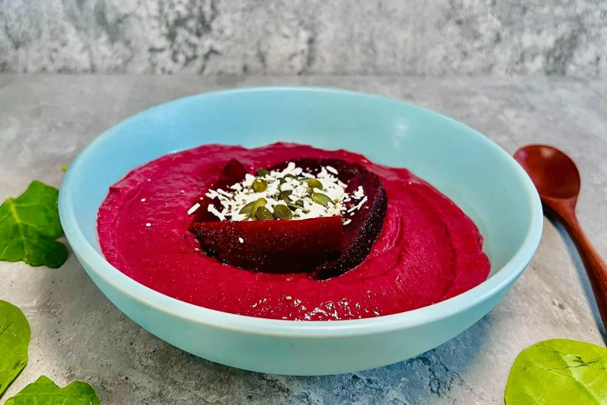 a side shot of a bowl filled with a beet smoothie suitable for diabetics