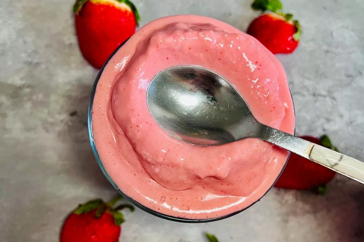 a spoon on top of a Strawberry Cottage Cheese Smoothie