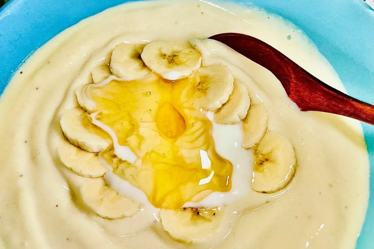 a spoon scoping Cottage Cheese Smoothie Bowl