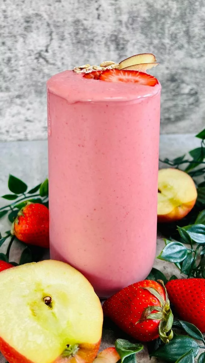 Apple Strawberry Smoothie served in a tall glass cup