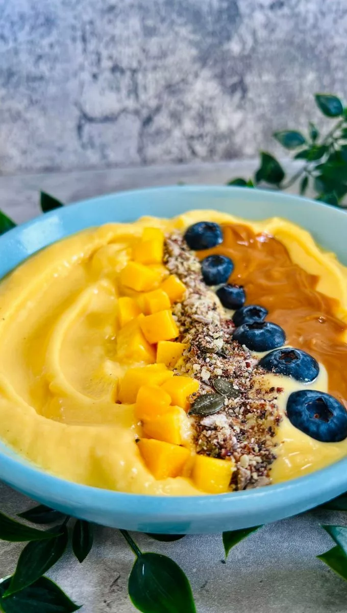 Mango Smoothie Bowl with lots of toppings