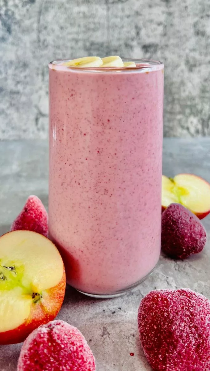Strawberry Apple Banana Smoothie served in a tall thin glass cup