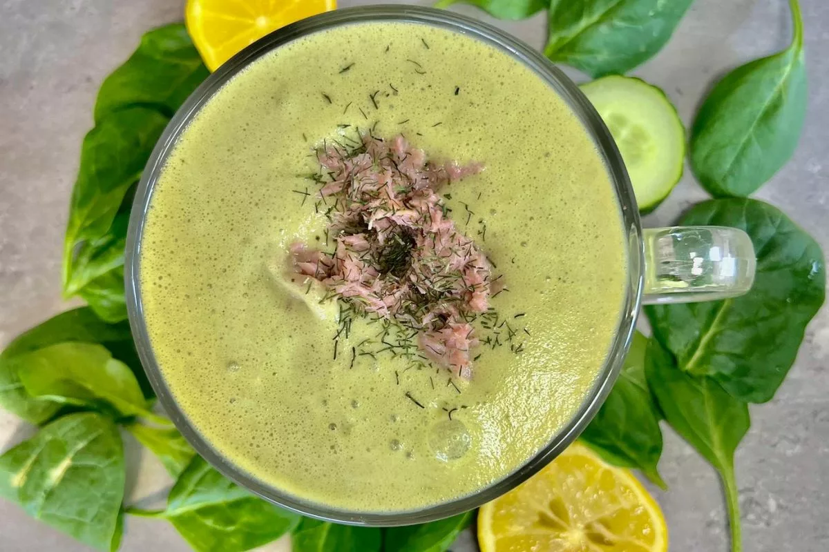 a tuna smoothie topped with tuna chunks and dill