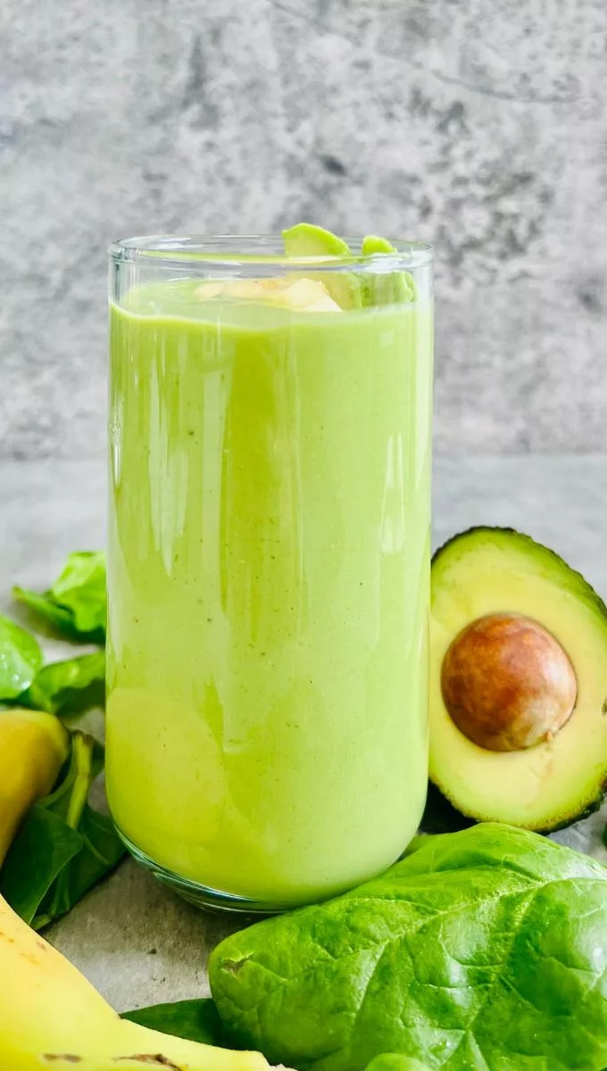 Banana Avocado Smoothie served in a tall thin glass cup