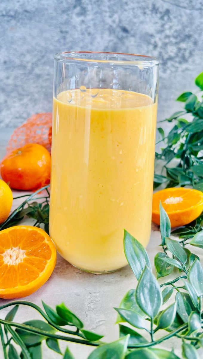 Clementine Smoothie served in a tall thin glass cup