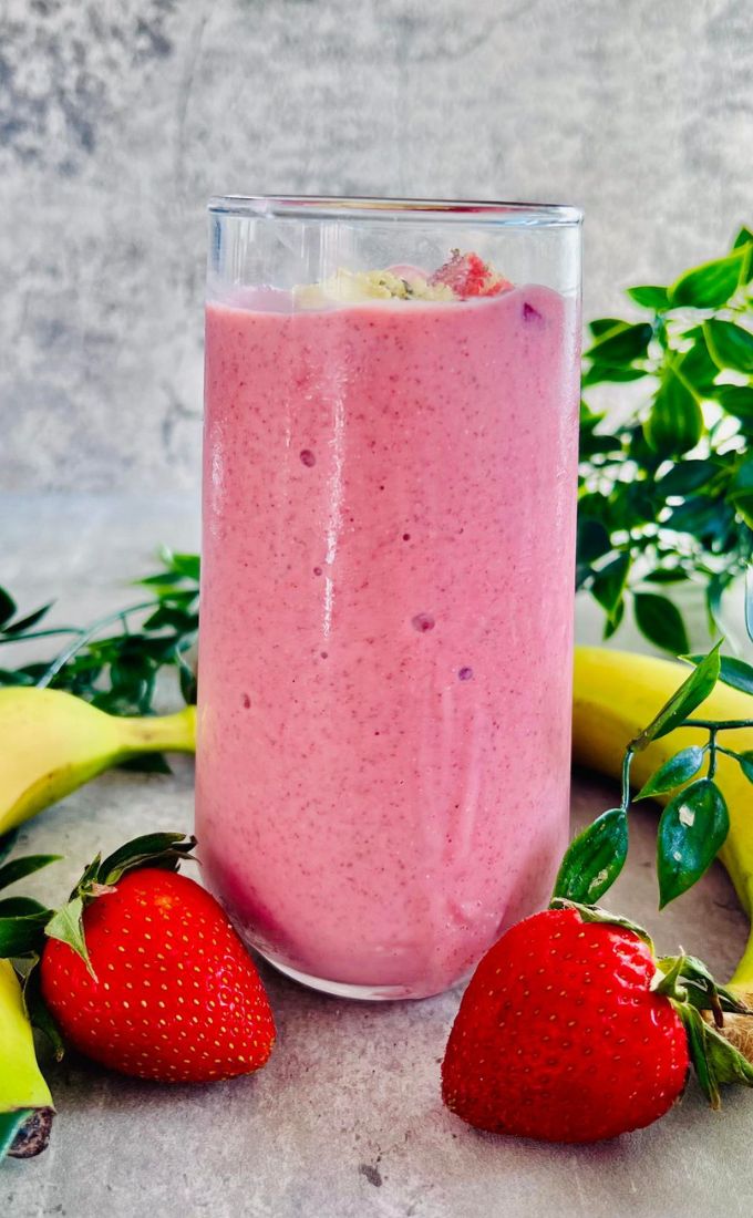 Strawberry Banana Weight Loss Smoothie served in a tall thin glass cup