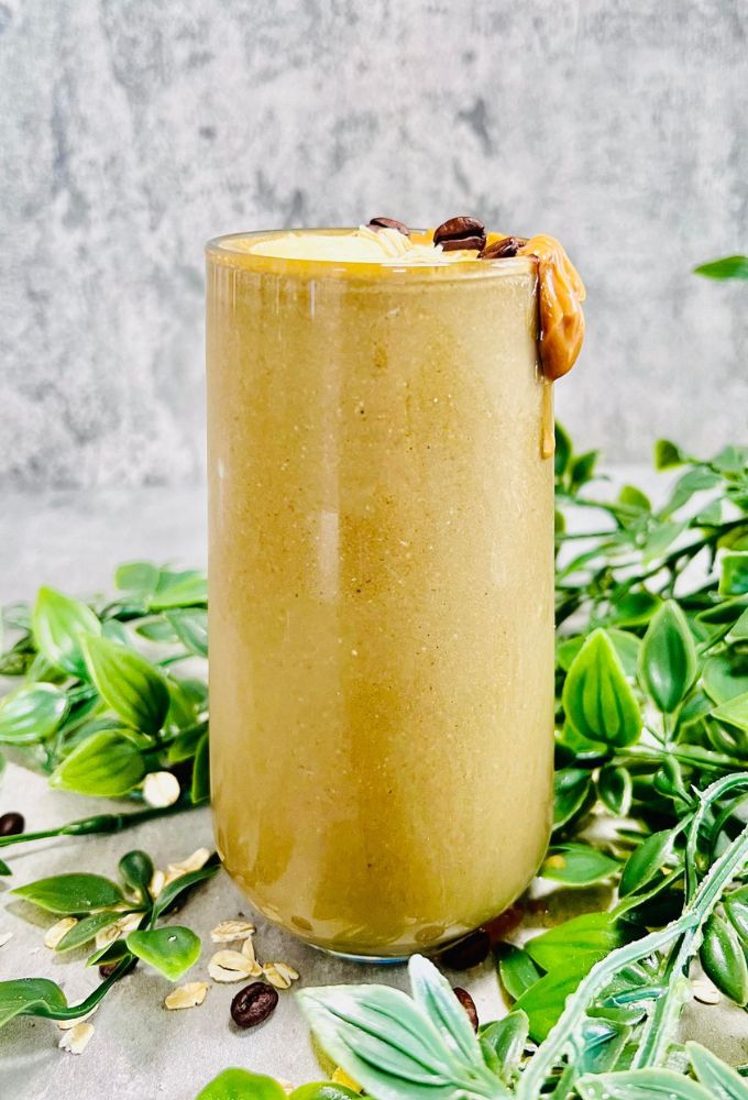 Coffee Protein Smoothie served in a tall thin glass cup